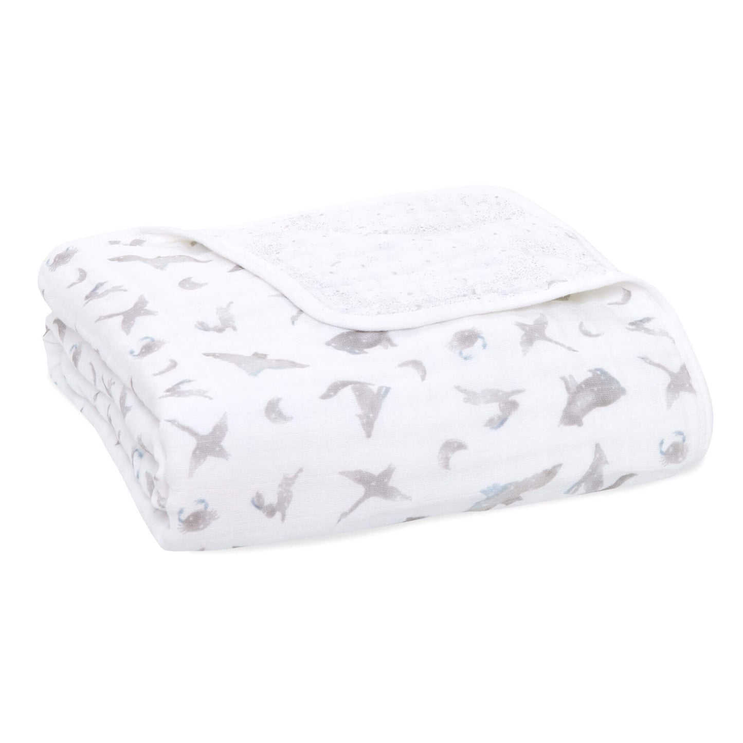 The aden + anais organic cotton muslin dream blanket features four layers of muslin for a soft baby blanket. Its uses go beyond cuddling, as it also makes a snuggly surface to lay your little one on.