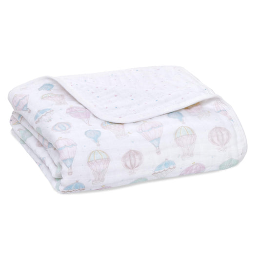 Made with 4 layers of cotton muslin, this aden + anais organic baby blanket is plush + warm, yet lightweight + breathable so littles never get too hot. Take it everywhere from snuggle time to tummy time, it’ll only get softer.