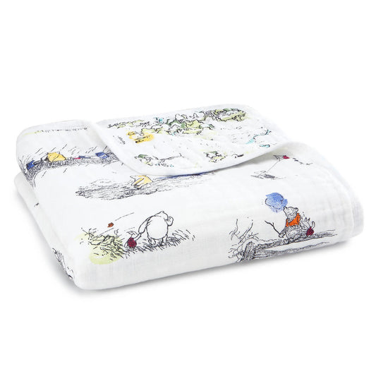 This aden + anais dream blanket features whimsical vignettes from Winnie The Pooh. Made with four layers of 100% cotton muslin, our softest, most plush baby blanket's uses go beyond cuddling, as it also makes a snuggly surface to lay your little one on no matter where the day takes you.