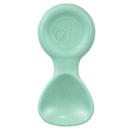 Weaning spoon in a mint shade shown from above, displaying the rounded head and curved scoop.