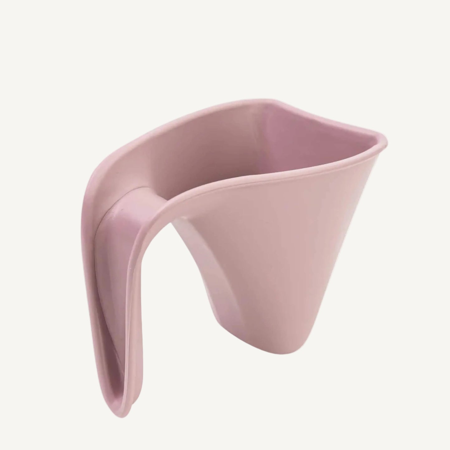 Soft pink baby bath jug with curved handle and gentle pouring edge designed for rinsing little hair during bath time.