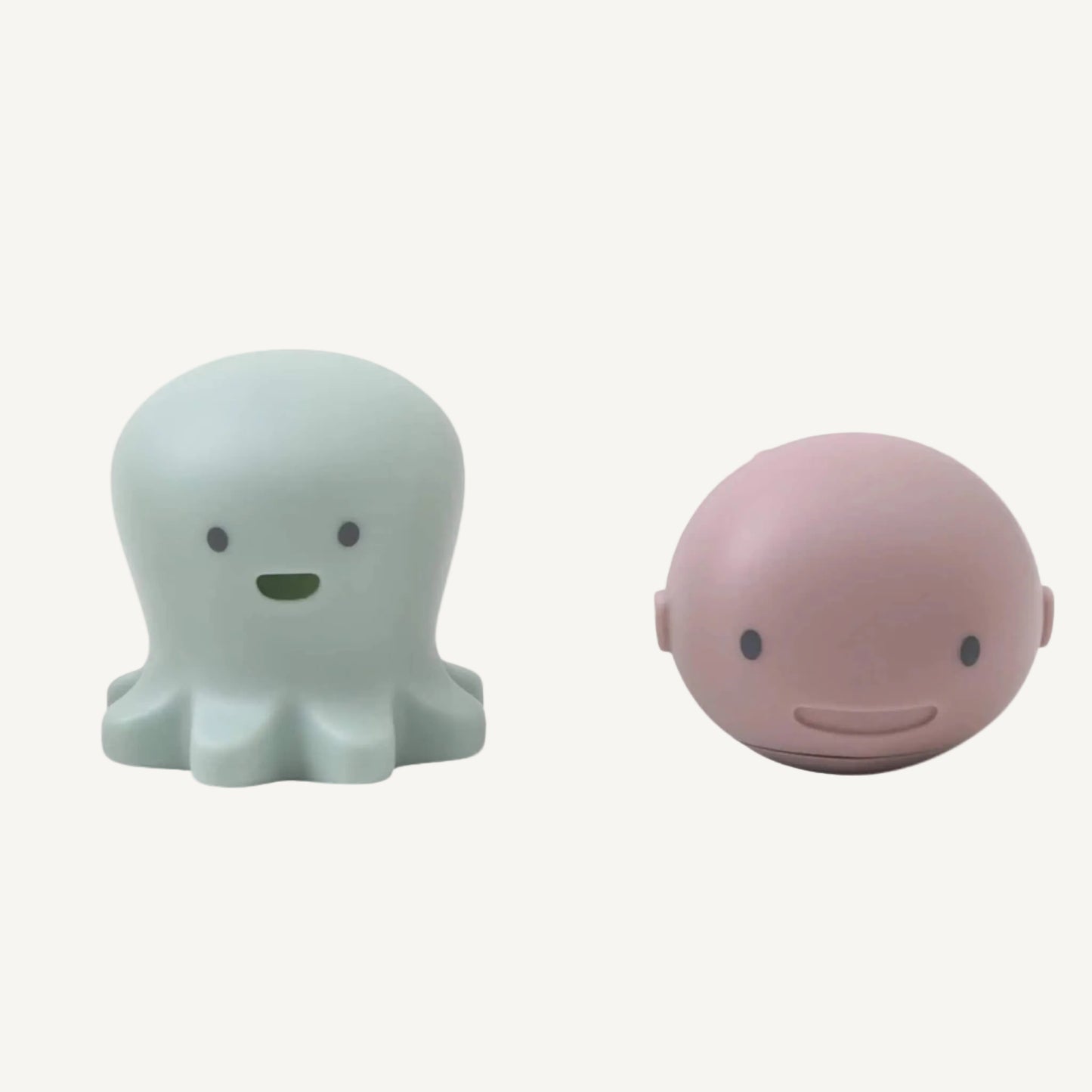 Pastel octopus and whale silicone bath toys designed for splashing, squirting water and interactive baby bath play.
