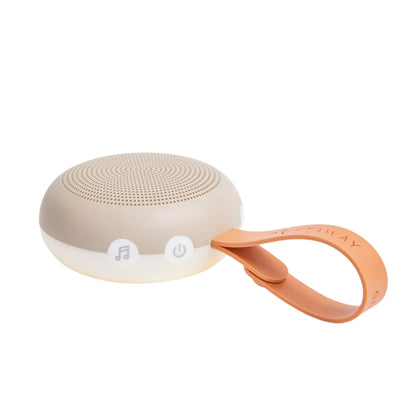 The ergoPouch Drift Away Portable White Noise and Nightlight Machine shown in taupe with a soft orange strap, featuring clear button controls and a compact, rounded design.