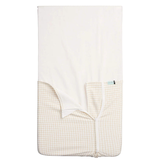ergoPouch Hug Me Blanket in caramel grid print, showing soft cotton fabric with two-tone design.