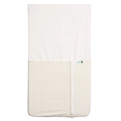 Cream blanket with caramel grid pattern and zip closure along the middle.