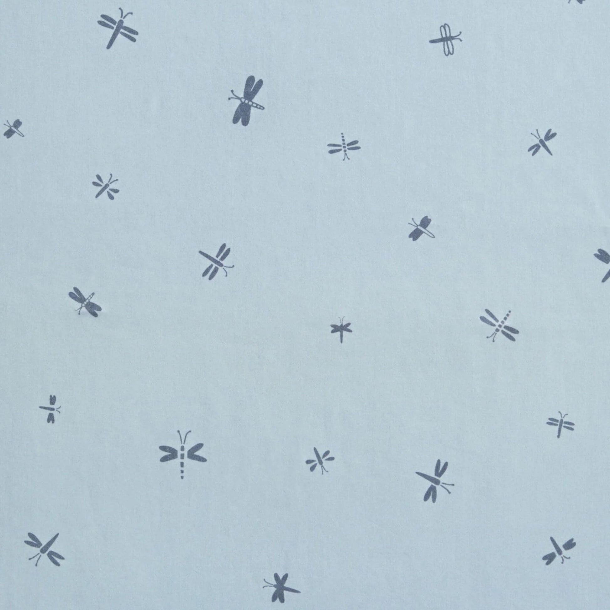 Close-up of the blue fabric design on the ergoPouch Winter Cocoon Swaddle Bag, featuring scattered dragonfly illustrations in dark grey.