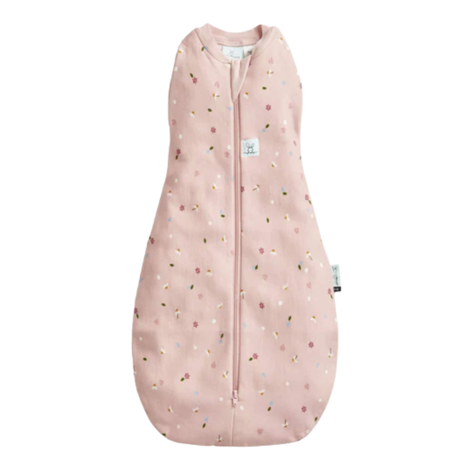 Ergopouch Summer Cocoon Swaddle Bag in the Daisies print shown flat with a pink background and a zip running down the front.
