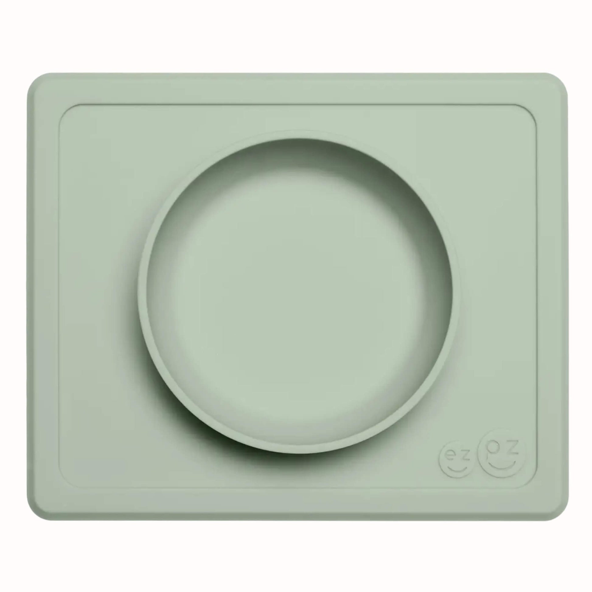 Sage silicone suction bowl with matching rectangular placemat designed for toddler meals and snacks.