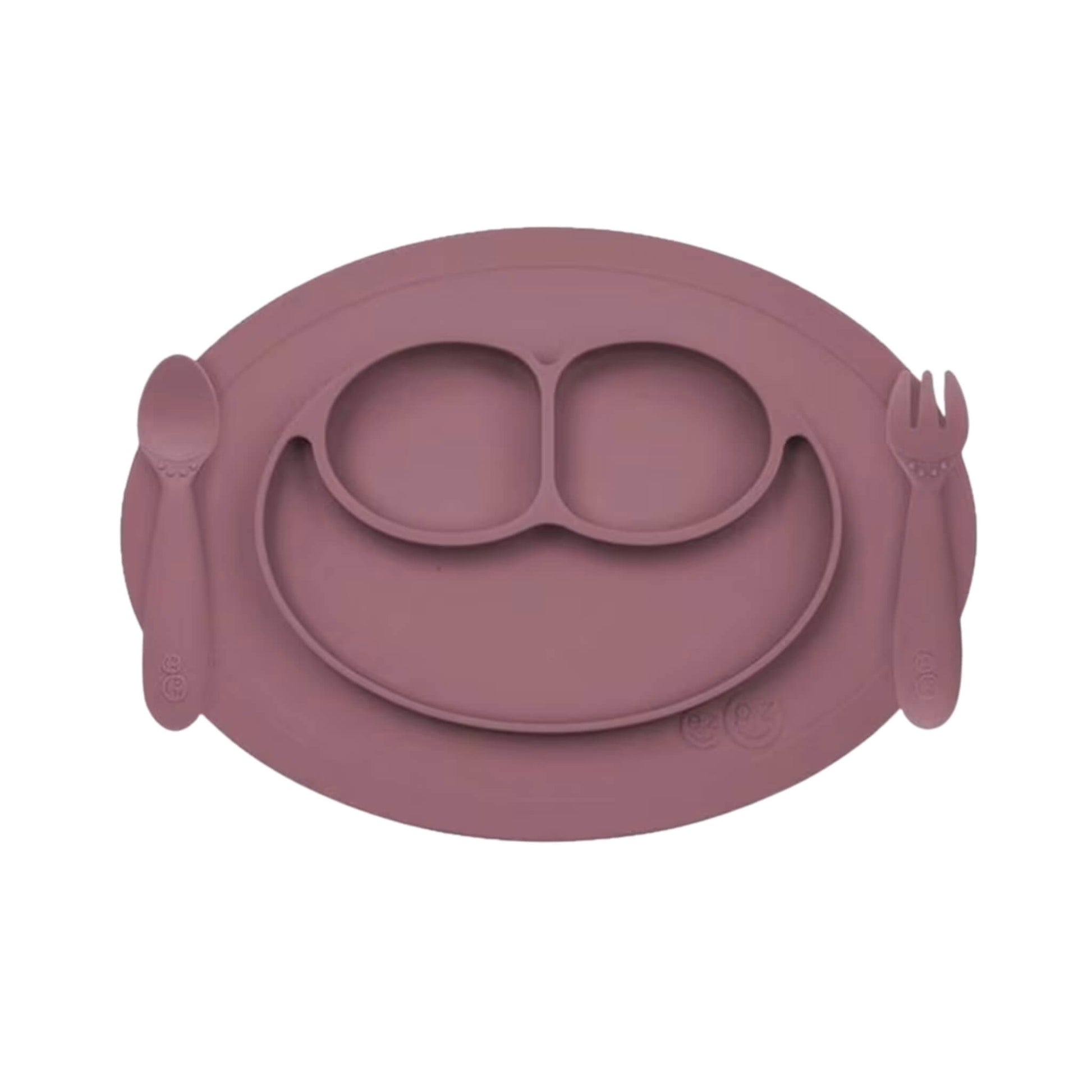 Ezpz Mini Feeding Set in Mauve shown with matching silicone mat, spoon, and fork designed for toddlers.