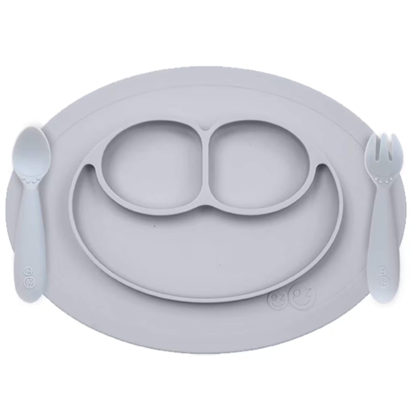 Ezpz Mini Feeding Set in Pewter shown with matching silicone mat, spoon, and fork designed for toddlers.