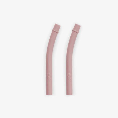 Ezpz Mini Straws in Blush shown as a pair of reusable silicone drinking straws with angled design.