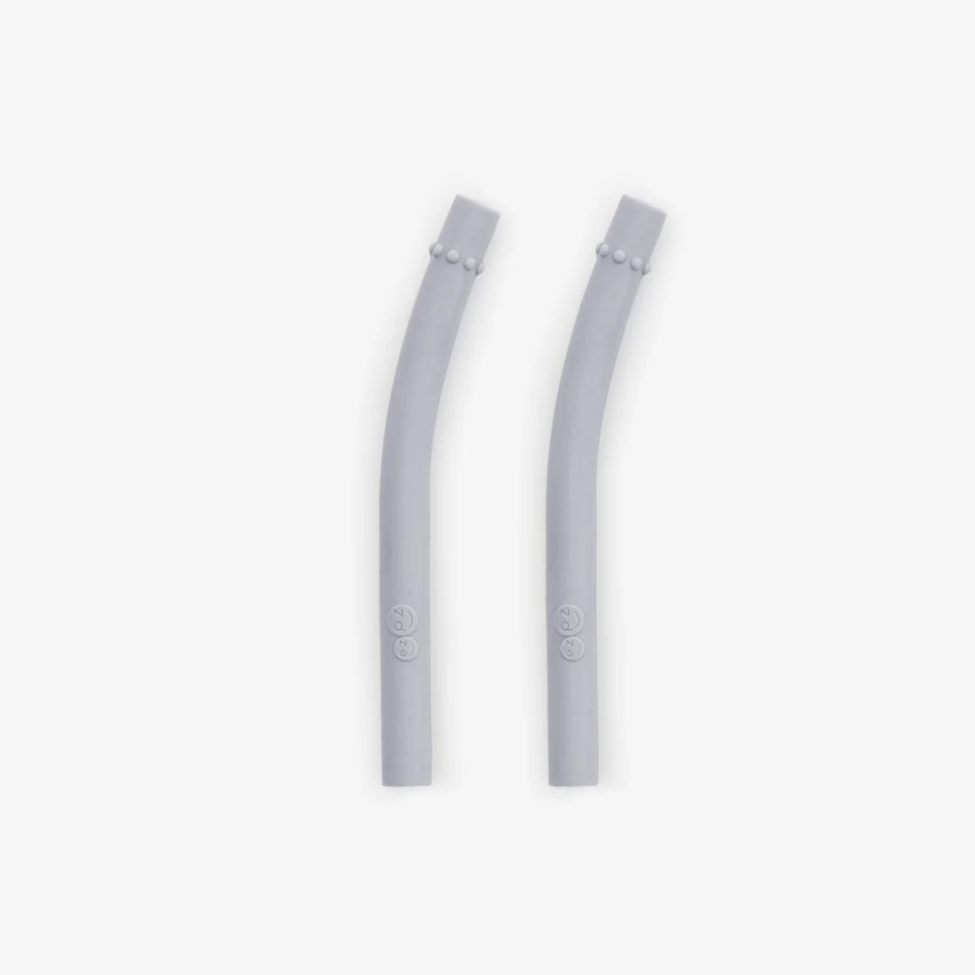 Ezpz Mini Straws in Sage shown as a pair of reusable silicone drinking straws with angled design.