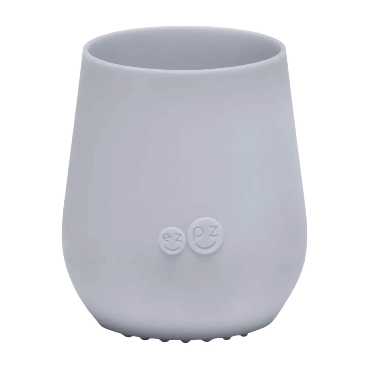 ezpz Tiny Cup in pewter grey shown from the front with a smooth tapered shape and subtle embossed logo on the centre.