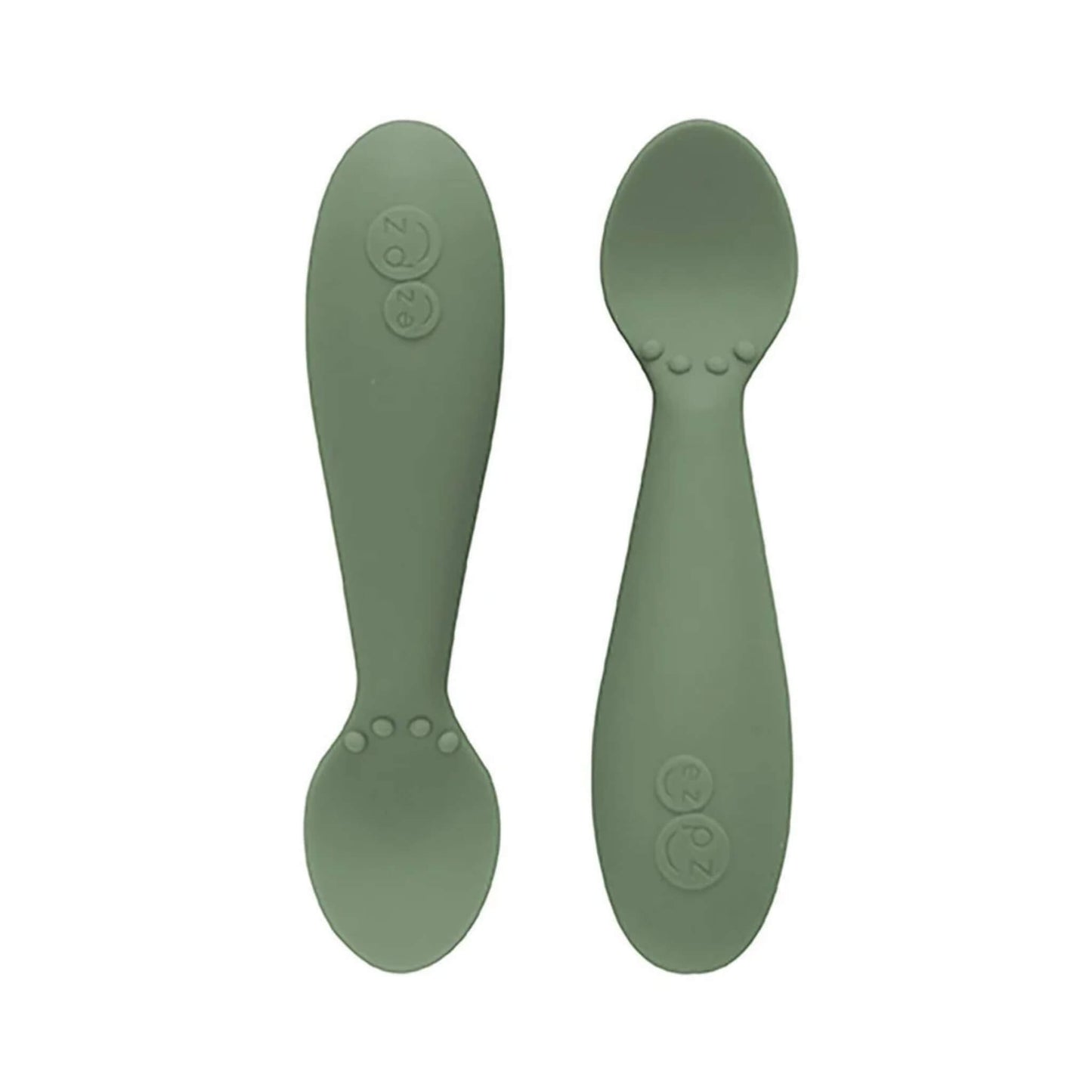 Ezpz Tiny Spoons in olive green, a pair of silicone infant training spoons with shallow heads and textured bumps near the base.