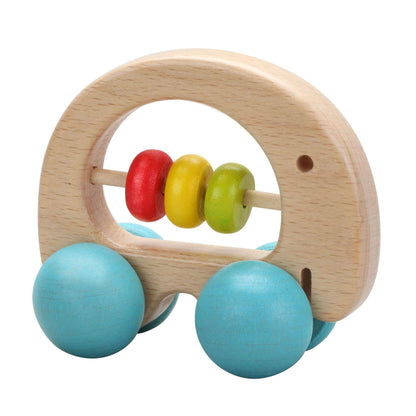 A Classic World Elephant Rattle made from beech wood, featuring colourful spinning beads and blue wheels, ideal for sensory and motor skill play.