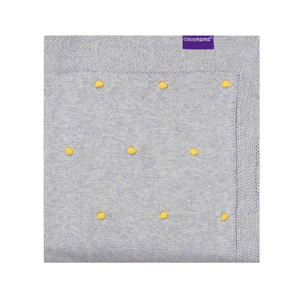 This soft Knitted Blanket by Clevamama combines luxurious 100% Organic Cotton with a stylish baby-safe pom pom design. Ideal for using while out and about, or when you just fancy a cuddle.