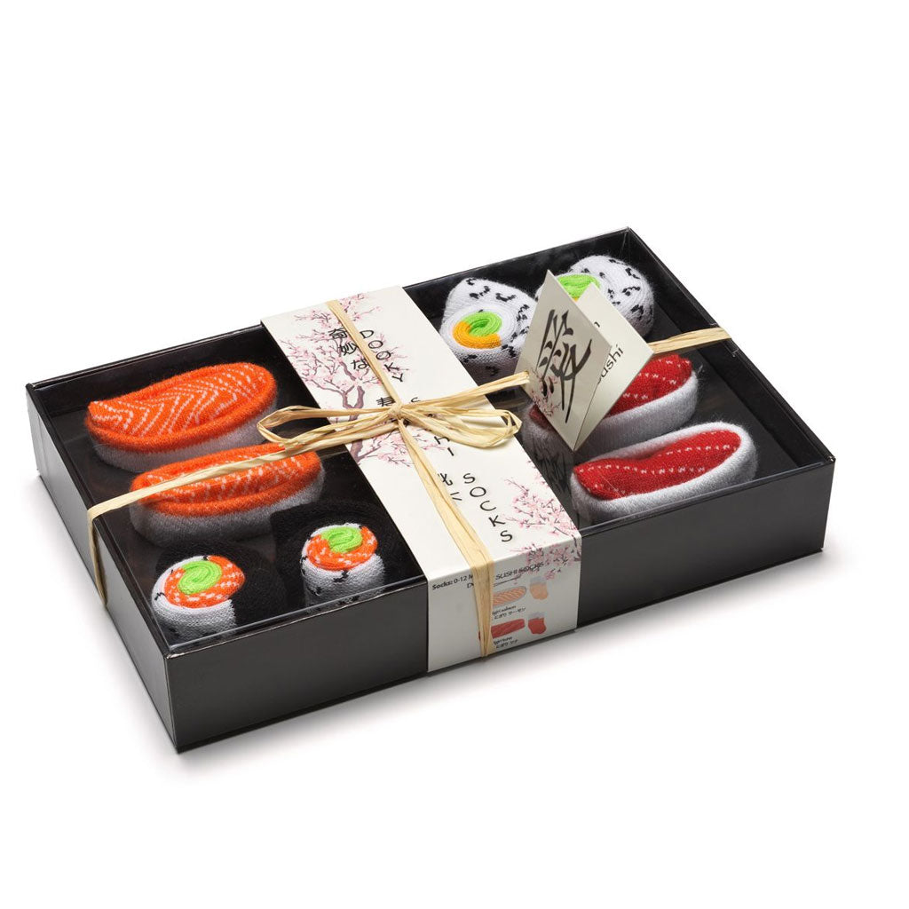 Set of 4 pairs of baby socks, rolled up like sushi. Presented in Dooky Gift Box.