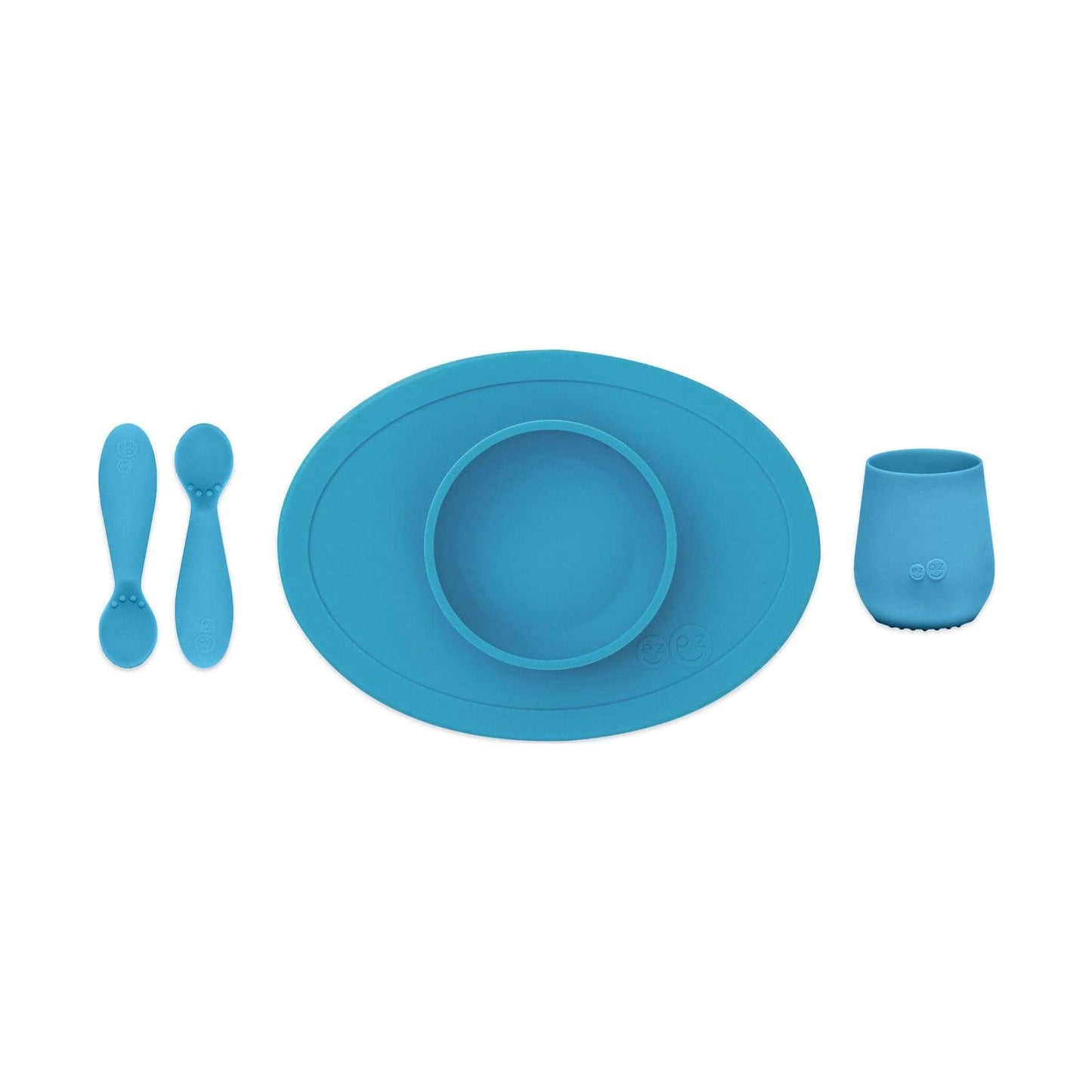 The EzPz Tiny First Feeding Set includes a bowl, a cup and set of 2 spoons. Made from 100% food grade silicone and designed with a paediatric food specialist; this set helps baby to  learn to feed independently.