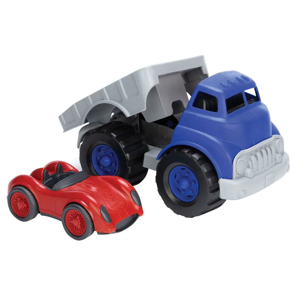 This sturdy blue truck hauls a sleek red hot rod on its back, and has a flatbed that tilts up to allow the car to roll off.