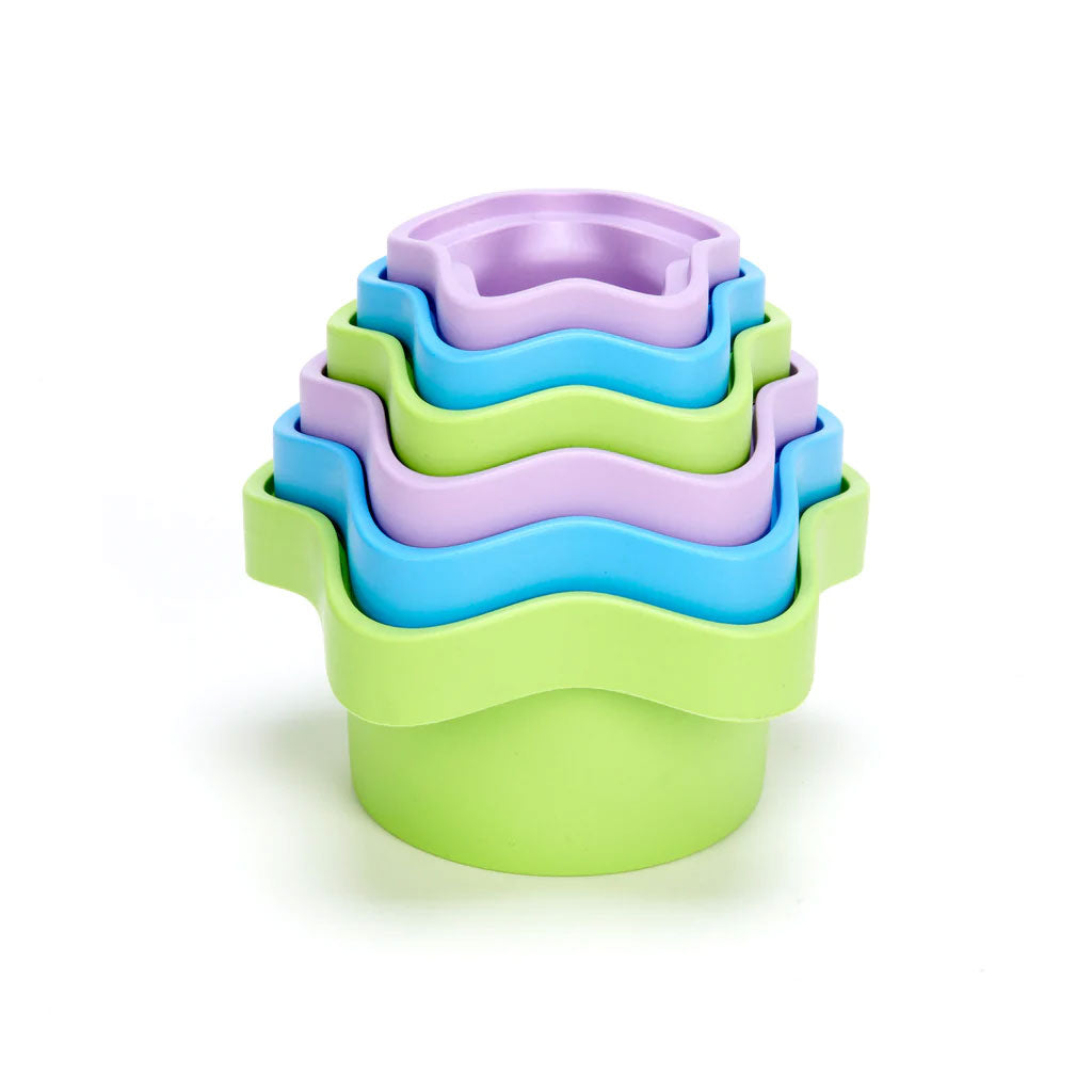 Six graduated cups, dozens of possibilities for bath and play time. Scoop and pour water, build towers by turning upside down, or just sort sizes to nest. The My First Green Toys™ Stacking Cups are colourful and fun, and teach basic counting and math concepts.