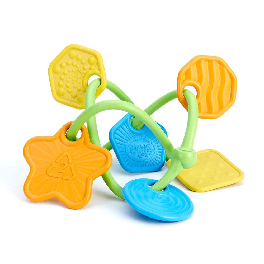 Shake, rattle and explore with the My First Green Toys Twist Teether. Tiny hands can easily grasp this lightweight, three dimensional, ultra-safe teether. Each uniquely shaped and colourful charm has a distinct texture to stimulate visual and tactile senses.