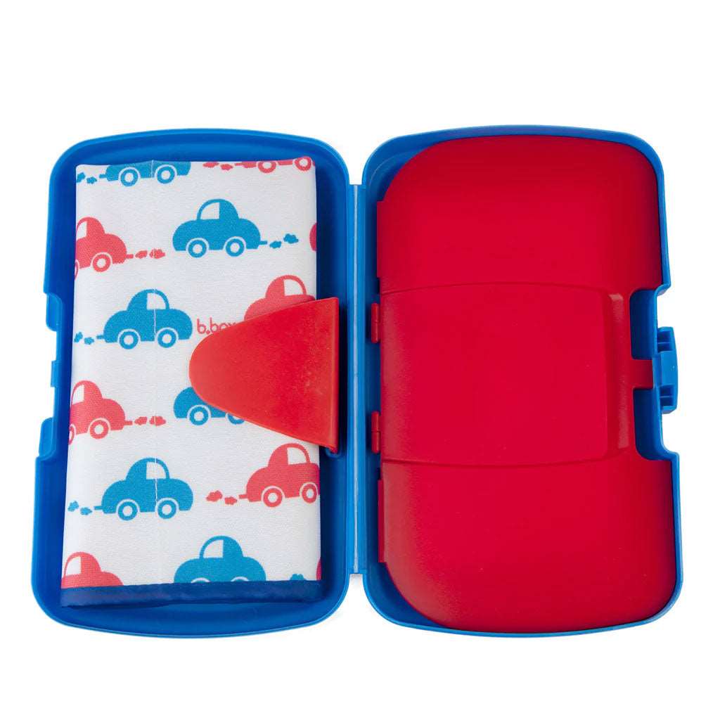 The only diaper wallet with a built in wipes compartment and dual access to wipes. Wipes can be accessed inside when it’s change time, or if you need to quickly clean little fingers, grab a wipe from the external hatch. Comes with funky, easy clean change mat and plenty of room for storage for two disposable diapers or even a spare change of clothes.