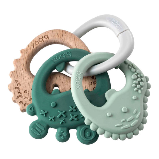 Designed to grow with baby the b.box trio teether has three textured teethers on one handy ring offering the choice of silicone and beechwood throughout the teething journey.  Lightweight and easy to hold, use individually or as a set with customisable ring attachment to provide relief to sore, achy gums and stimulate sensory development.